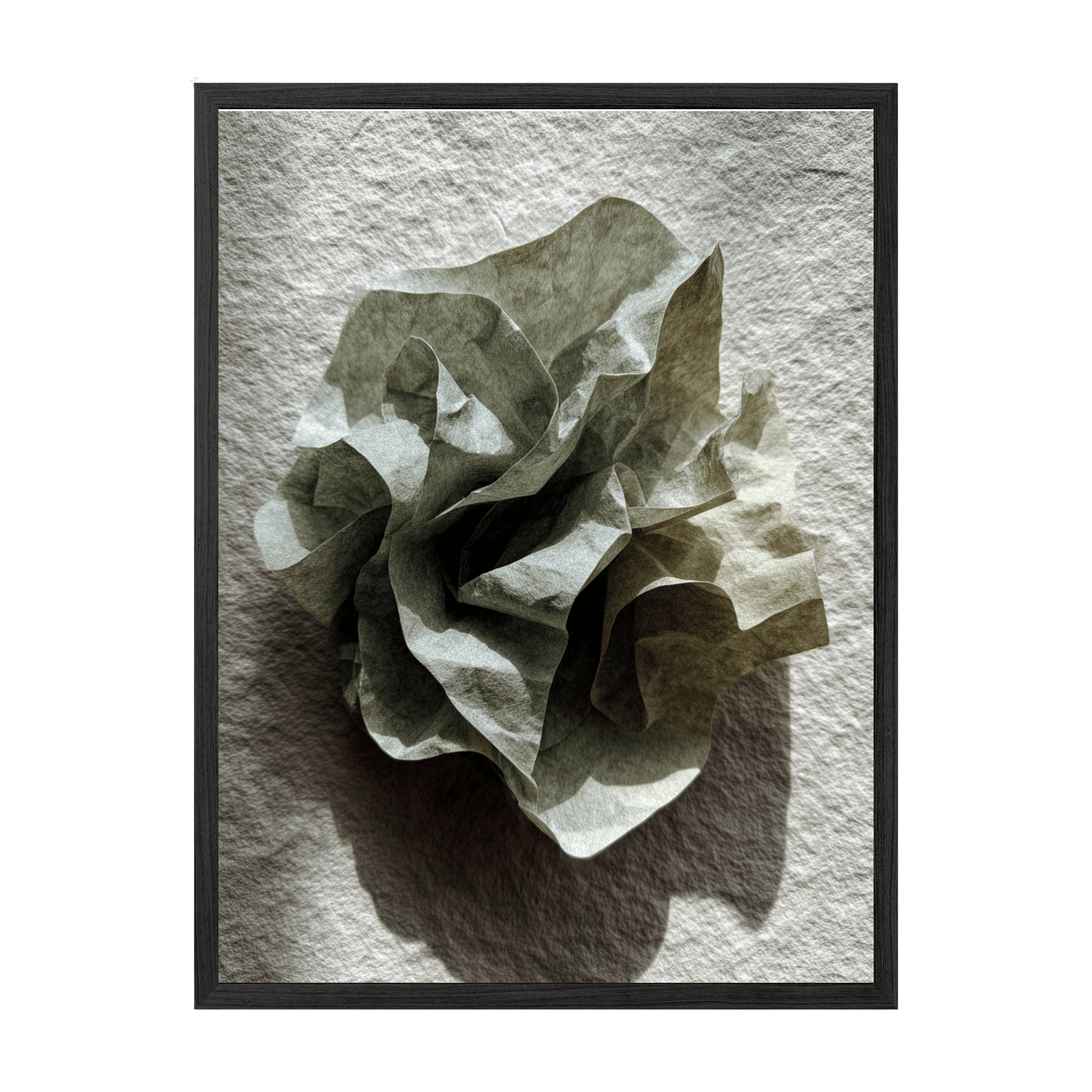 Framed artwork of a crumpled piece of paper on textured gray background