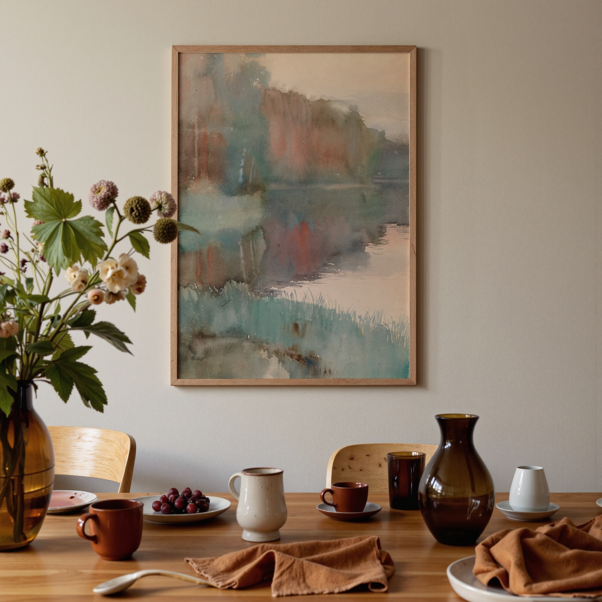 Dining room with a table set for a meal, featuring a vase of flowers, plates, and a framed abstract painting on the wall.