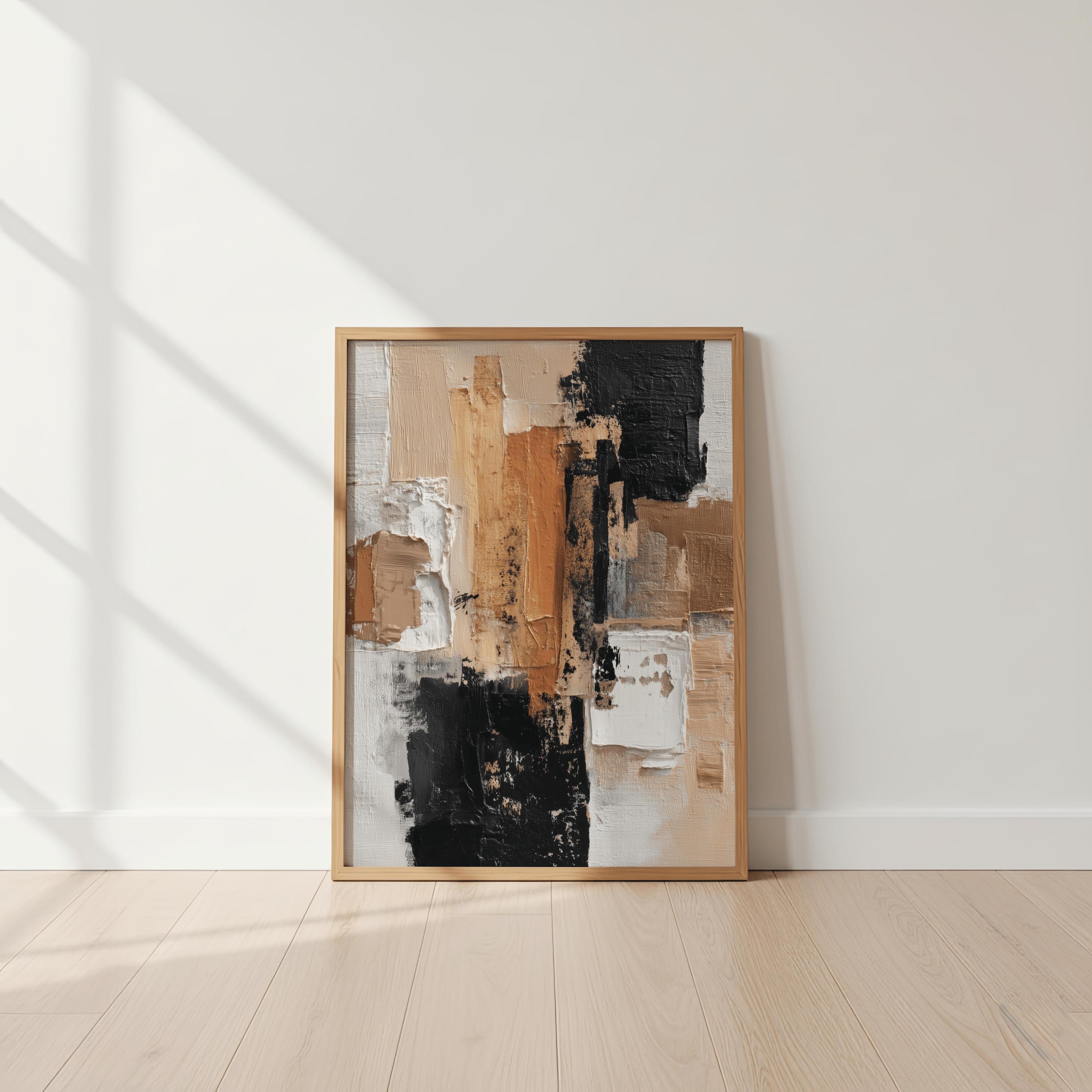 Abstract art piece in a wooden frame on a white wall