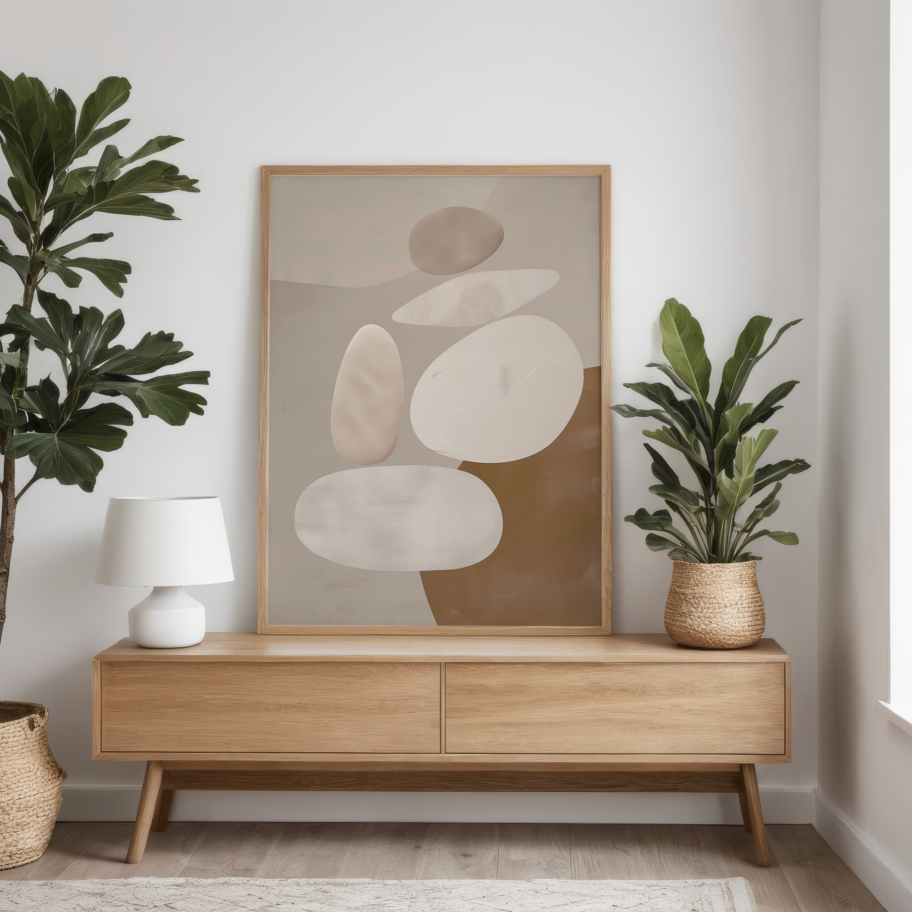 Wooden console table with abstract art and plants in a room setting