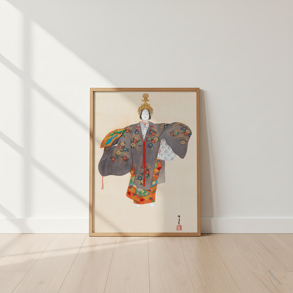 Framed artwork of a traditional garment on a white wall