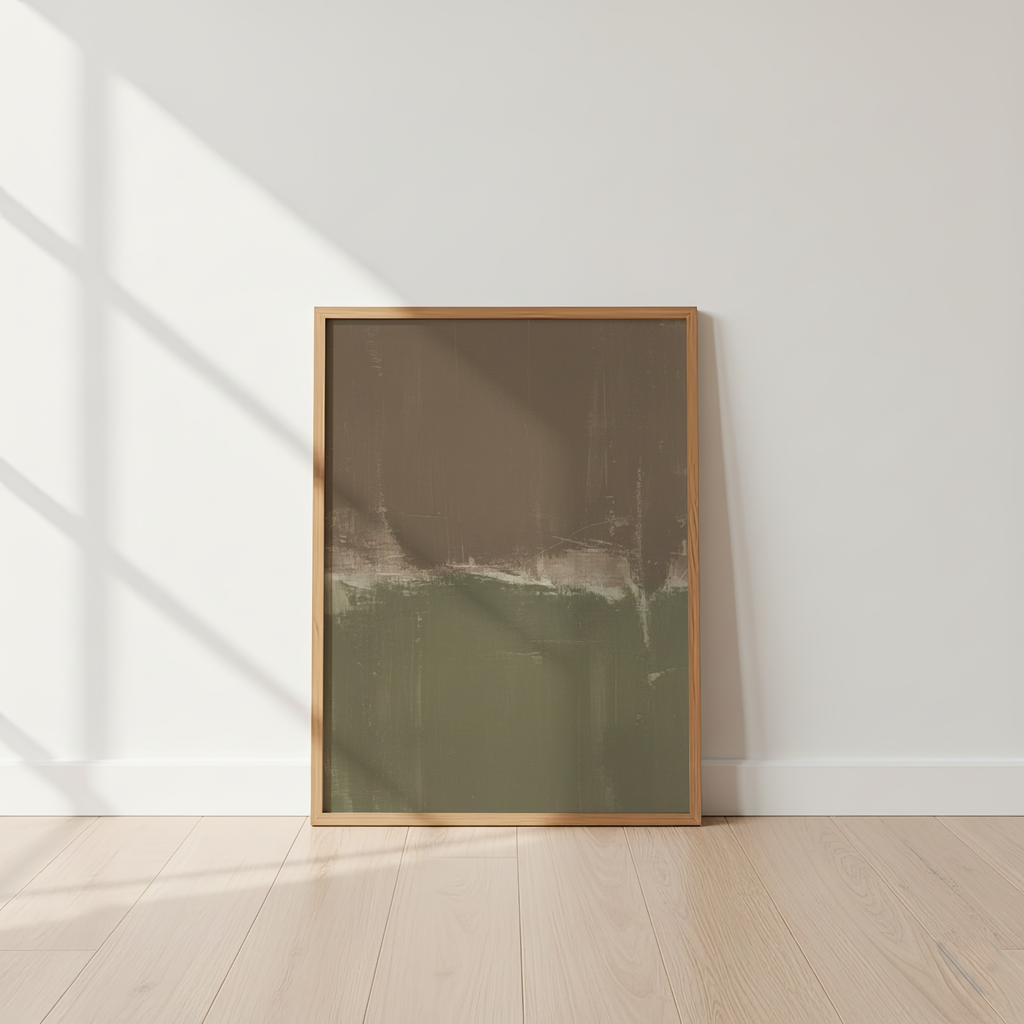 Framed abstract art piece on a white wall with wooden floor