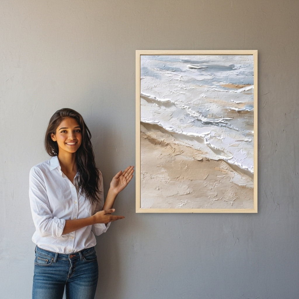 Woman standing next to a framed beach painting on a wall