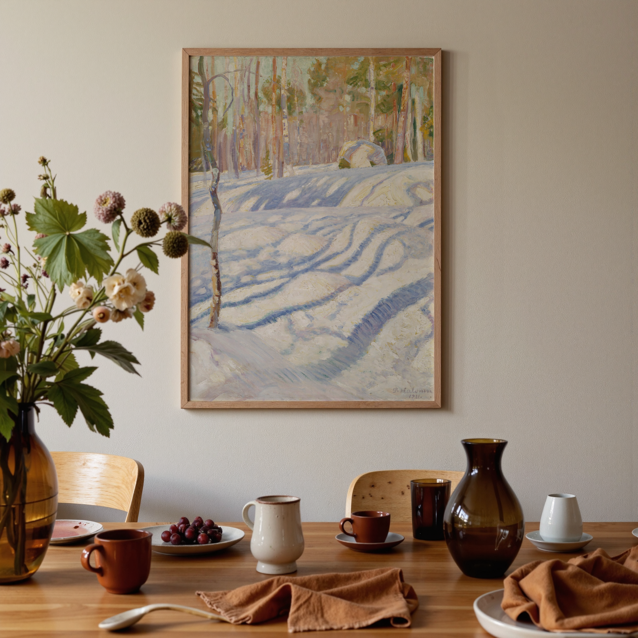 Dining room with a table set for a meal, featuring a vase of flowers, plates, and a painting on the wall.