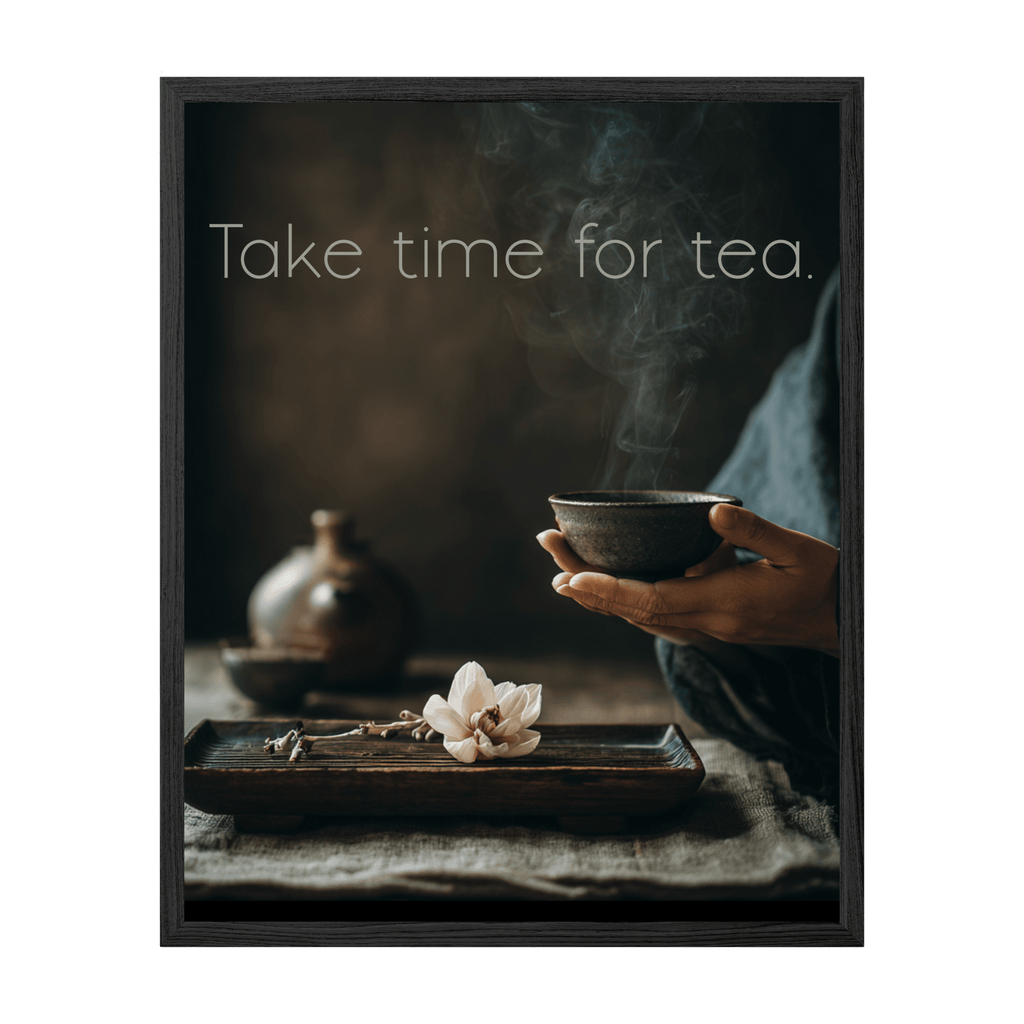 Framed print with a person holding a tea bowl, flowers, and text 'Take time for tea.'