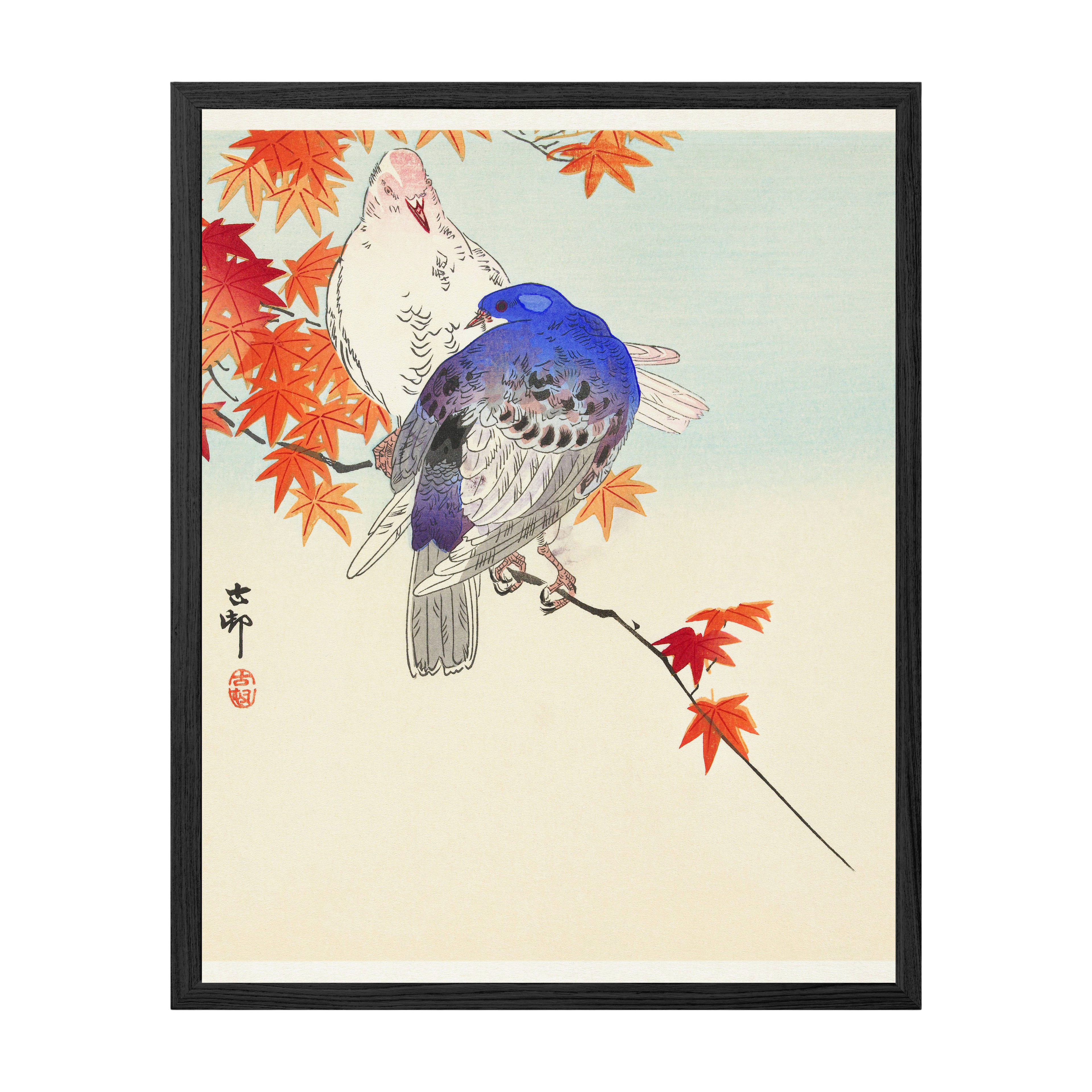 Framed artwork of two birds on a branch with autumn leaves