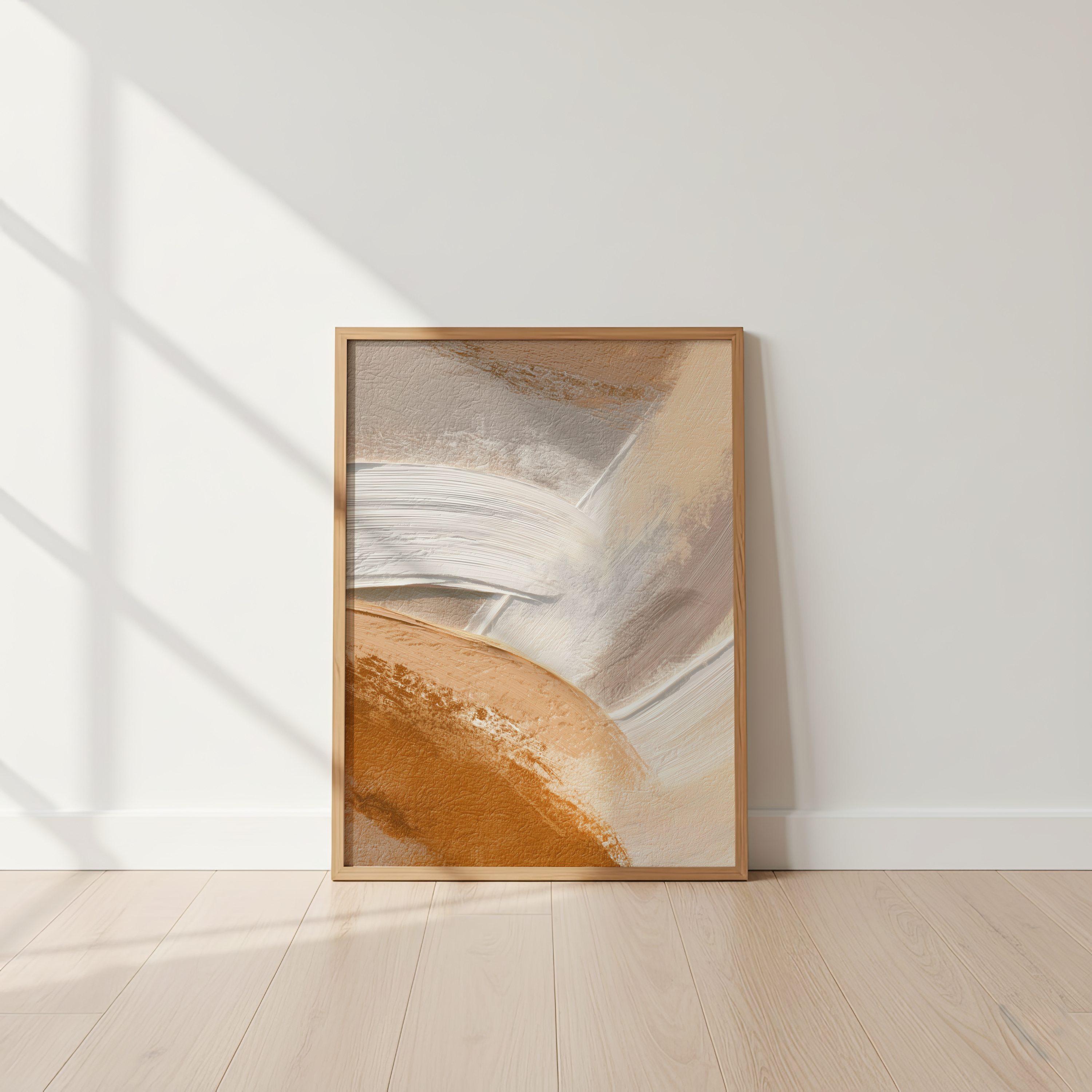 Framed abstract art piece on a white wall with wooden floor